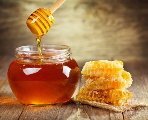 bocal de miel et cadre de cire